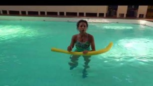 'Aqua Fitness Aqua Aerobics exercise with Marietta Mehanni Noodle shallow jump forward and back'