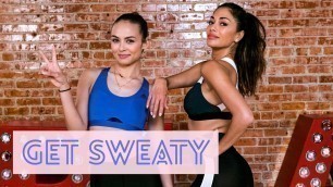 'NICOLE SCHERZINGER DANCES HER WAY THROUGH A CARDIO WORKOUT ON GET SWEATY WITH EMILY OBERG'