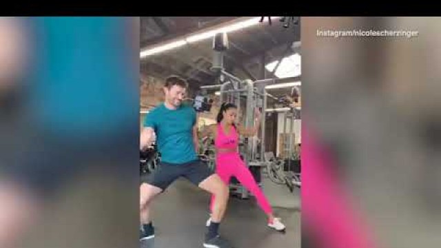 'Nicole Scherzinger and beau Thom Evans dance it out at the gym'