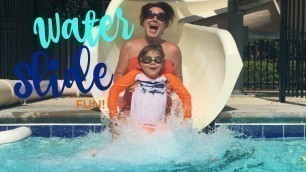 'Water Slide Fun at Lifetime Fitness Pool'