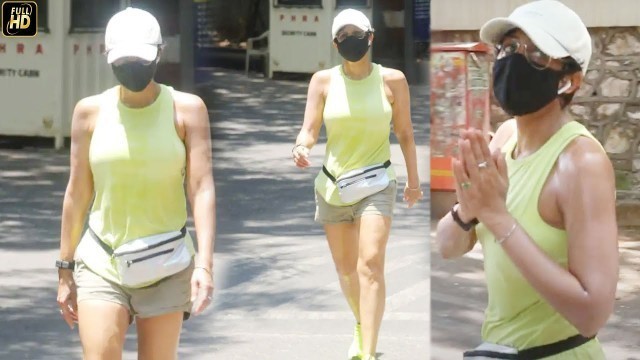 'NAMASTE! Mandira Bedi clicked in stylish fanny pack, neon running shoes'