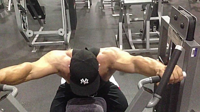 'Machine Shoulder Press - Seated Reverse Variation for Building Muscle Mass'